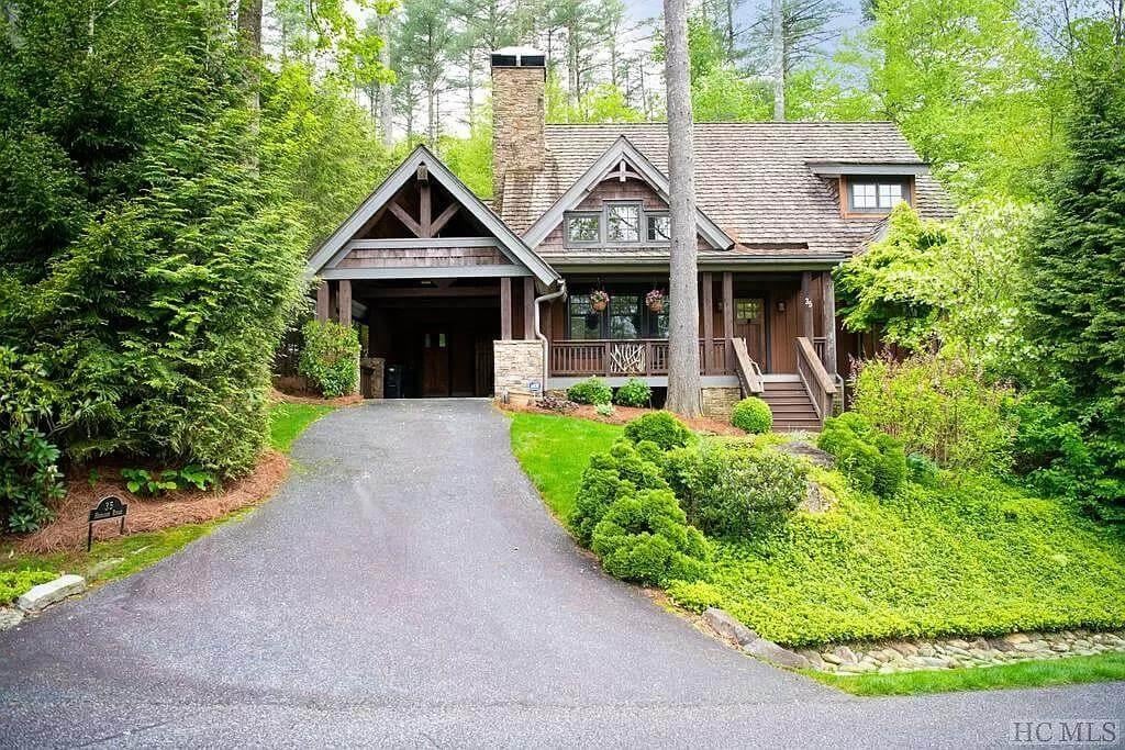 Notice the Timber Accents on This Charming Woodland Retreat
