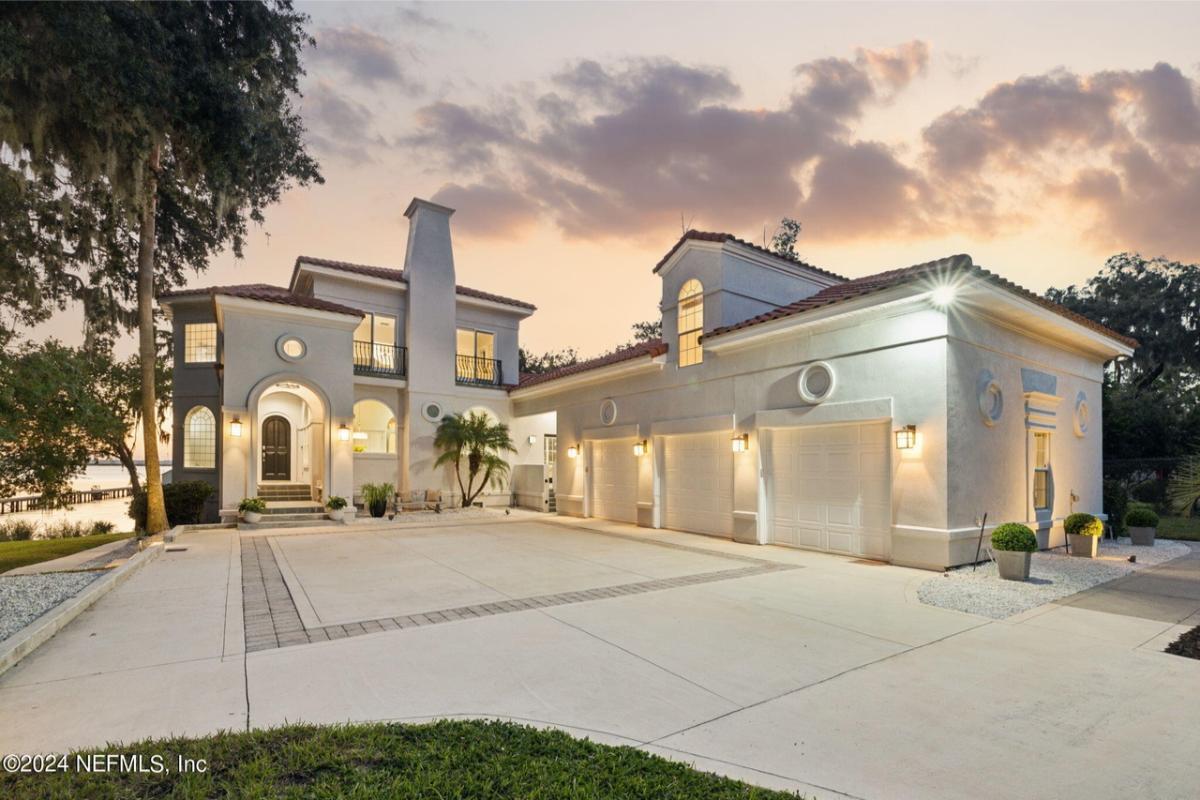 Mediterranean-Inspired Home with Striking Arched Entry