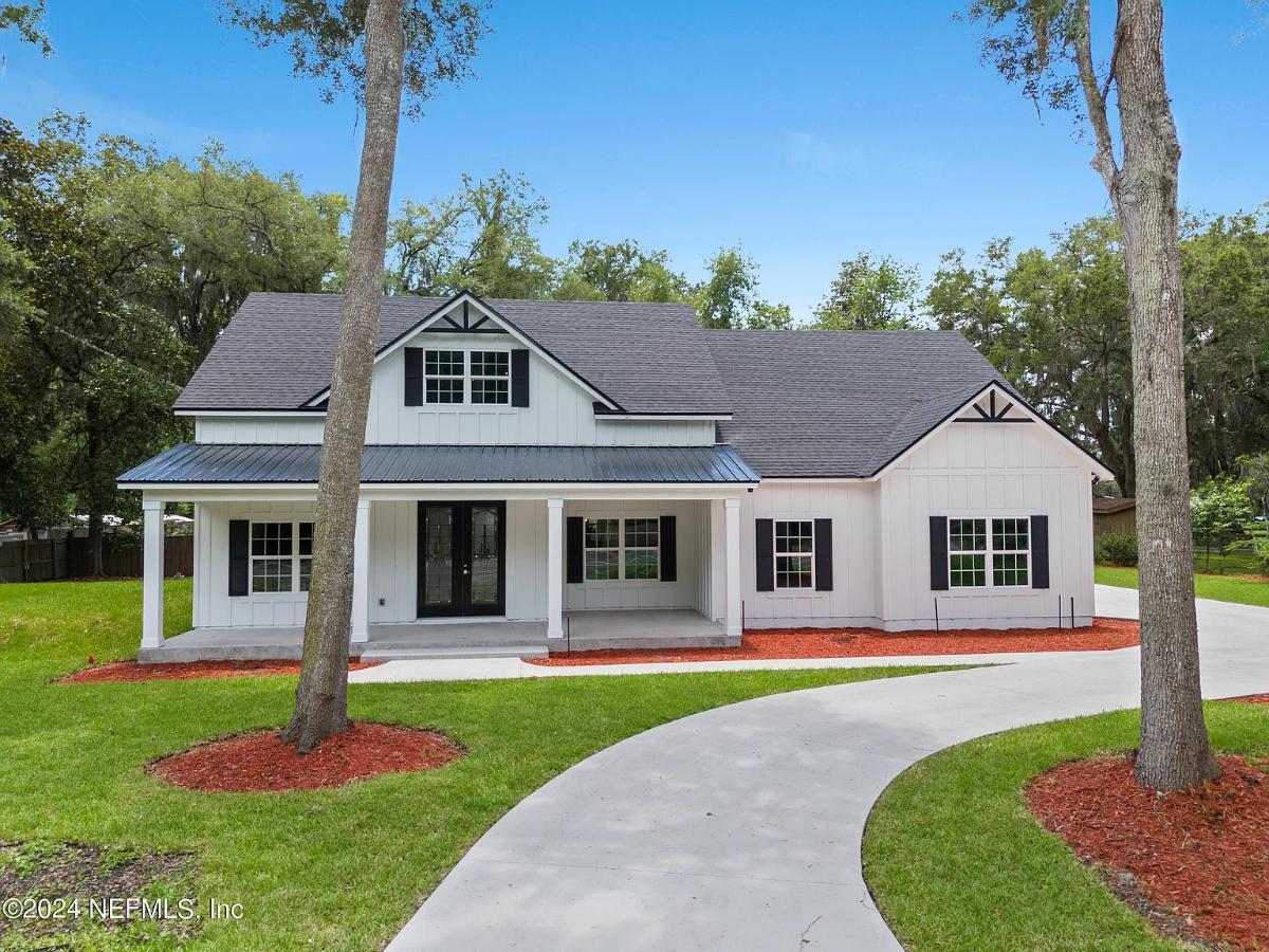 Classic American Farmhouse with a Wrap-Around Porch