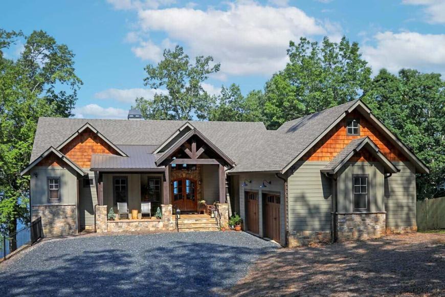 Rustic Lake House with Stone Accents and Wood Detailing