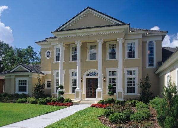 Grand Colonial Revival with Stately Pillars and Symmetrical Facade