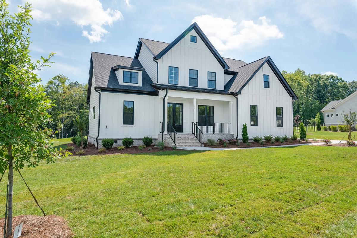 Traditional-Style 4-Bedroom Home with Front Porch and 2-Car Garage