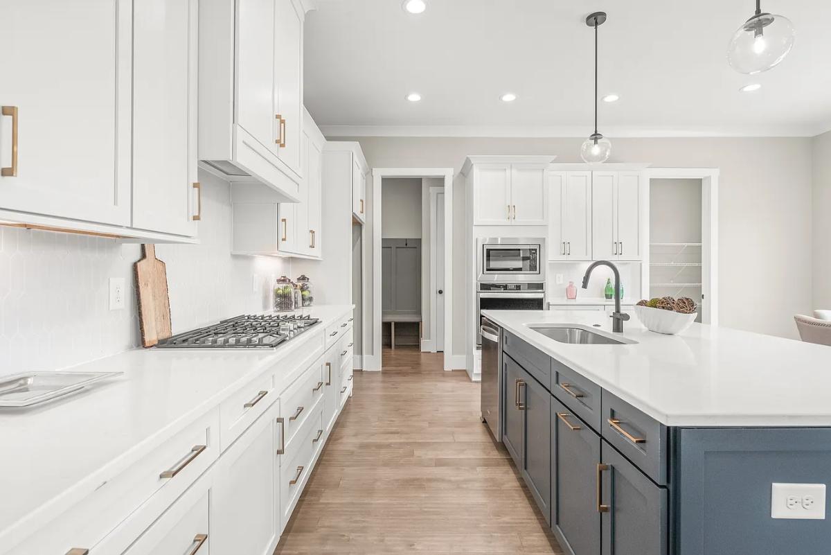 Traditional 3-Bedroom Home with Front Porch and 3-Car Garage (2,584 Sq. Ft. Floor Plan)