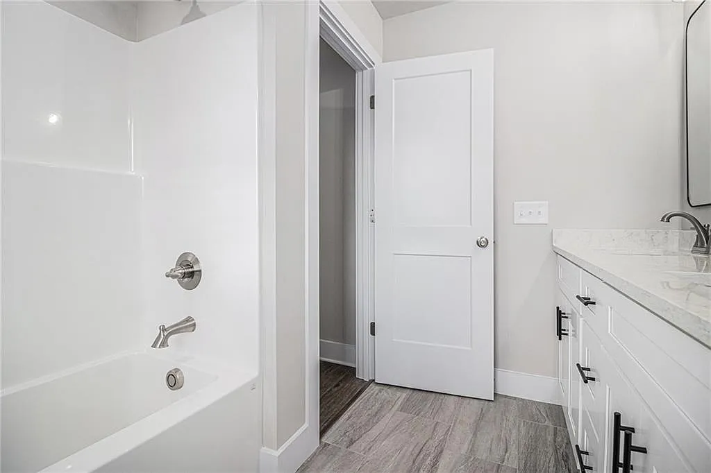 Traditional 3-Bedroom Cape Cod Home with Balcony and Unfinished Basement