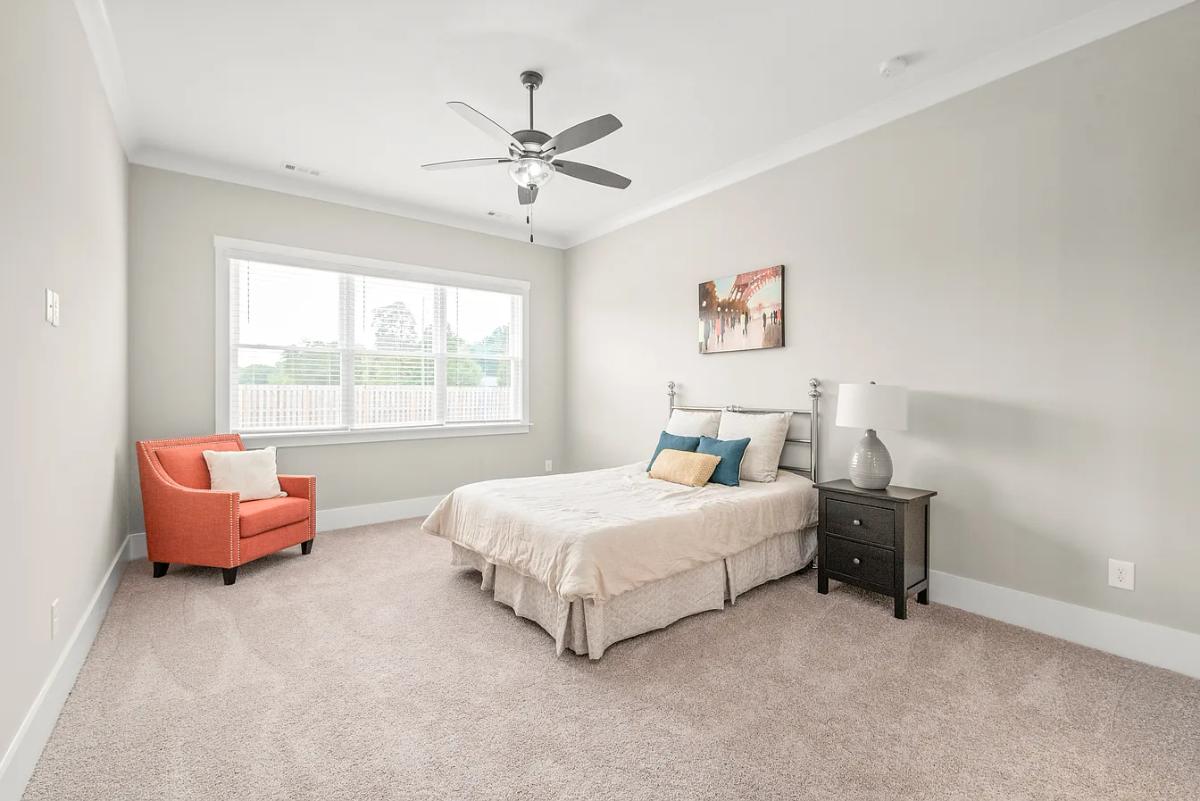 Traditional 3-Bedroom Home with Front Porch and 3-Car Garage (2,584 Sq. Ft. Floor Plan)