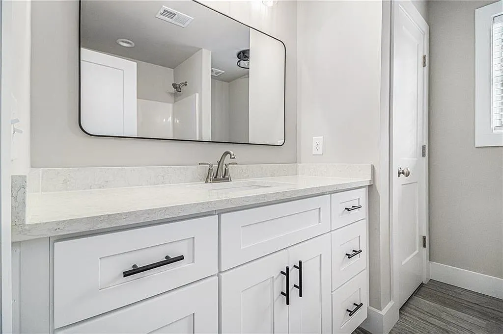 Traditional 3-Bedroom Cape Cod Home with Balcony and Unfinished Basement