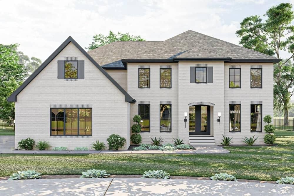 Classic Brick Facade with Symmetrical Windows and a Touch of Modern Elegance