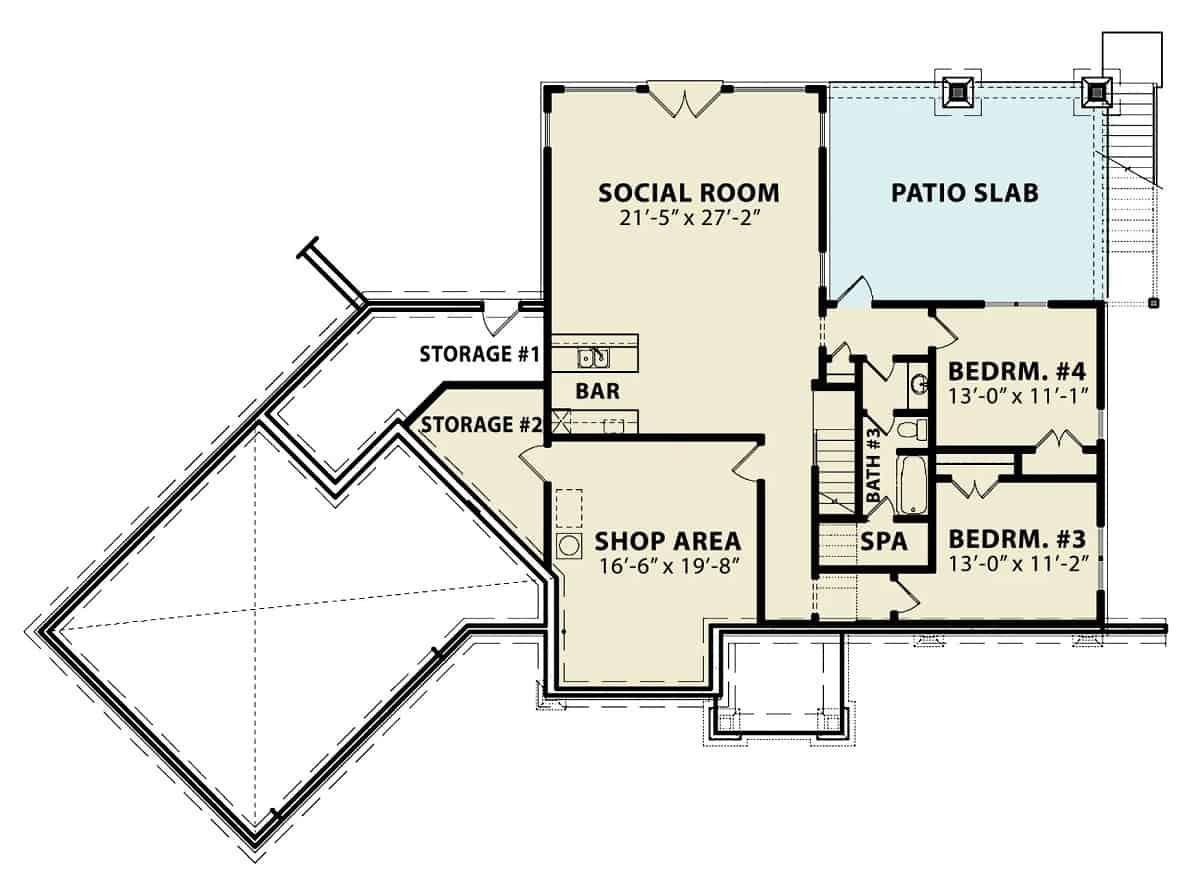Explore This Floor Plan with a Spacious Social Room and Workshop Area