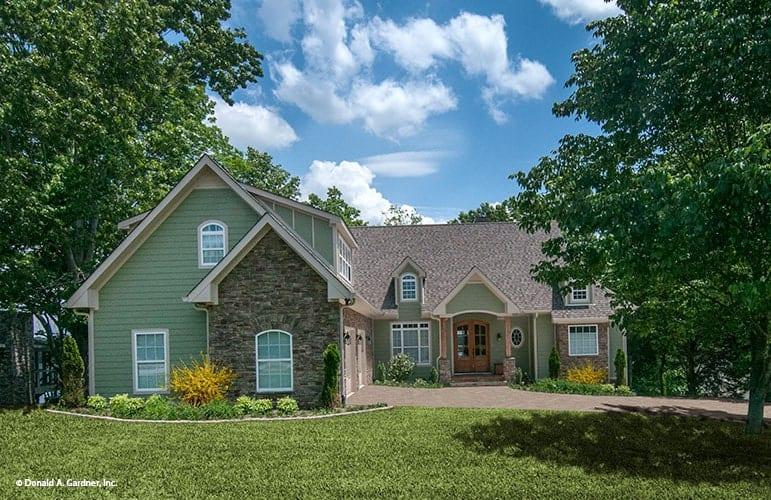 Charming Country Home with Stone Facade and Gable Roof