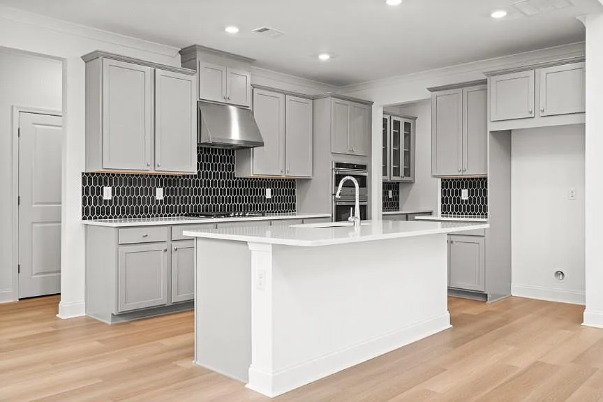 Traditional 5-Bedroom Home with Open Concept Living and Covered Front Porch