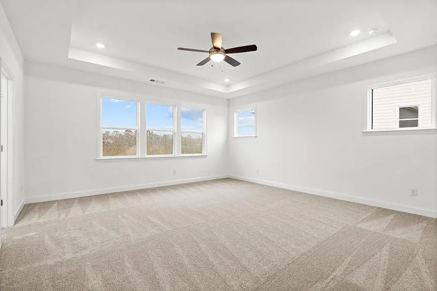 Traditional 5-Bedroom Home with Open Concept Living and Covered Front Porch