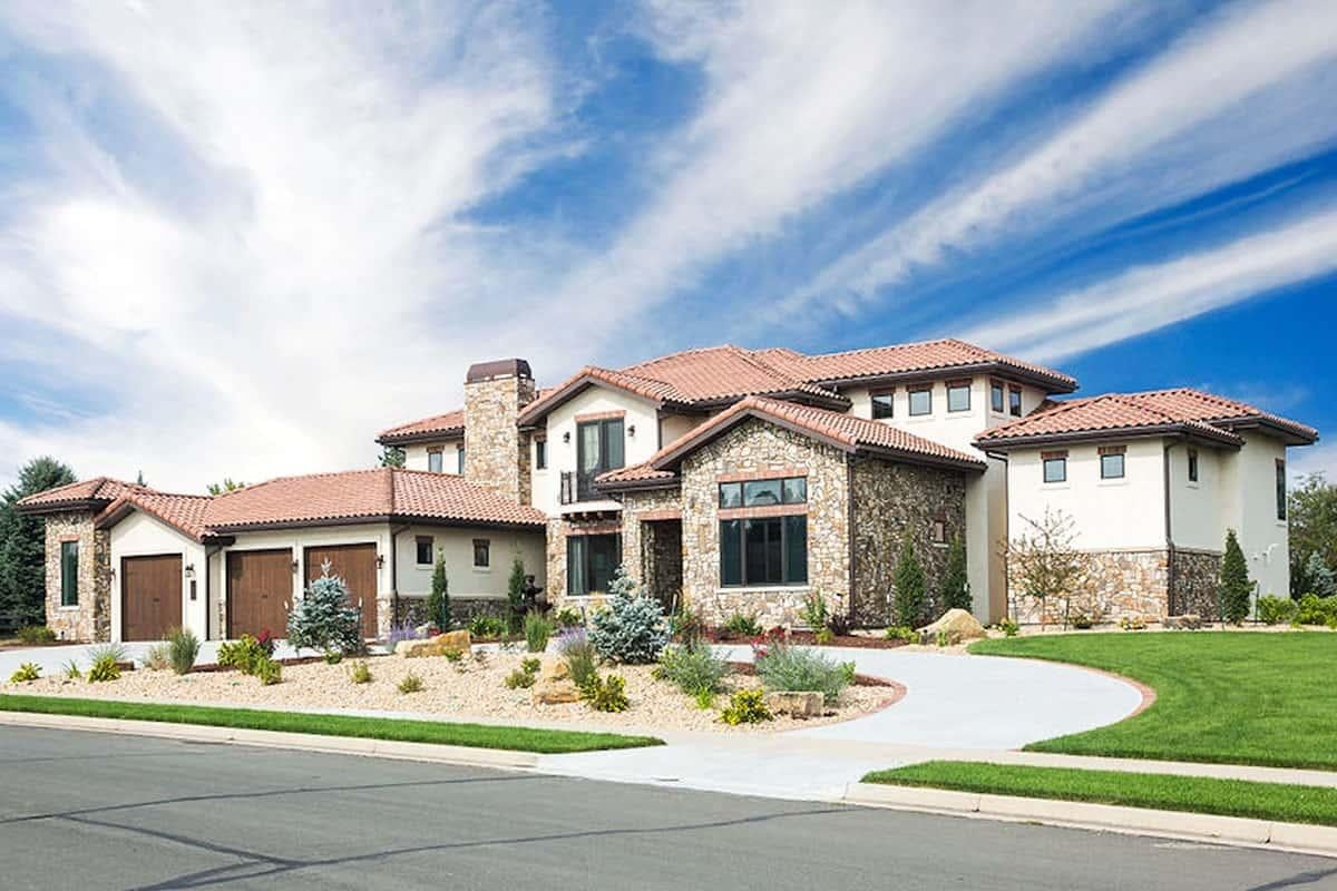 Mediterranean-Style Home with Striking Stone Facade