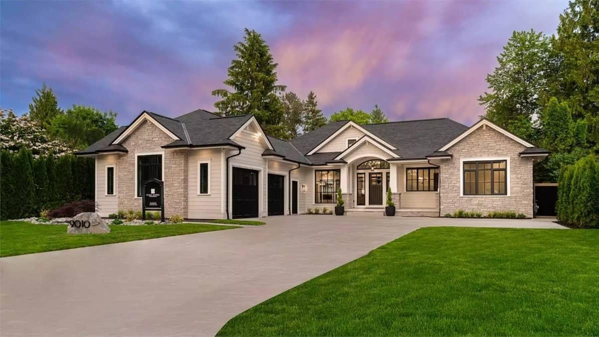 Classic Stone and Siding Exterior with Arched Entryway