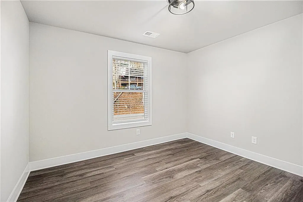 Traditional 3-Bedroom Cape Cod Home with Balcony and Unfinished Basement