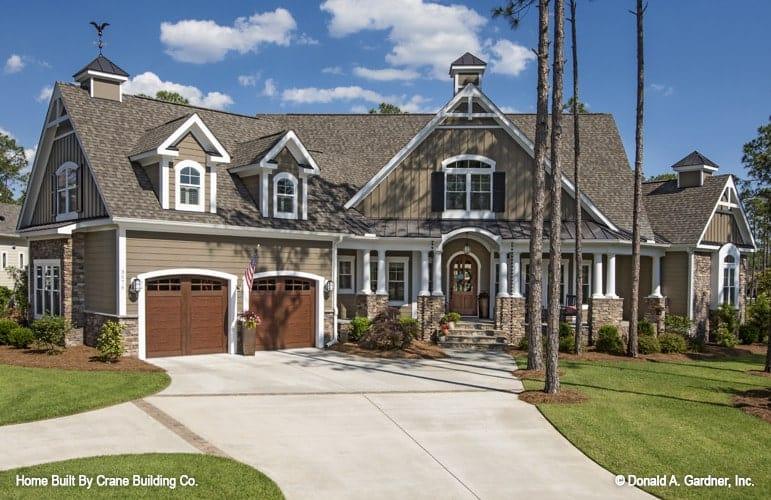 Classic Elegance with Dormer Windows and Stone Accents