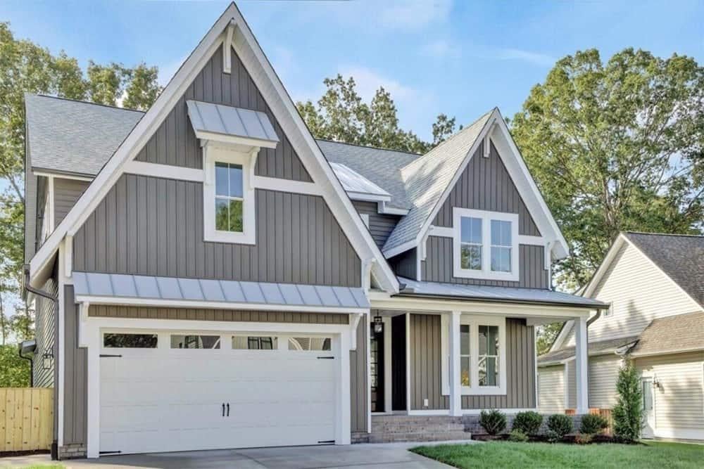 Charming Craftsman Home with Gabled Roofs and Crisp White Trim
