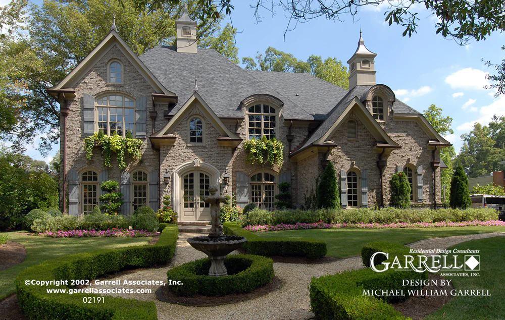 Take in the Classic Charm of This Stone Facade with Arched Windows