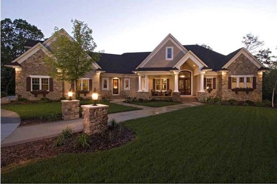 Classic Stone Facade with Warm Lighting Enhances This Home