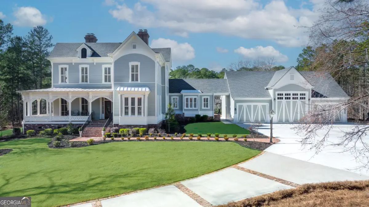 his $2,399,999 estate, built in 1883 and fully renovated, sits on 3.7 acres behind the gates of Reynolds Lake Oconee.