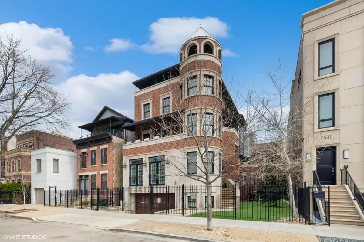 All this for $5,200,000 in Chicago. This custom-built 8,400 sq. ft. mansion in Chicago's Old Town/Gold Coast neighborhood offers 7 bedrooms, 5.5 bathrooms, and sits on a spacious double lot with a large side yard, rooftop deck, and turret tower.