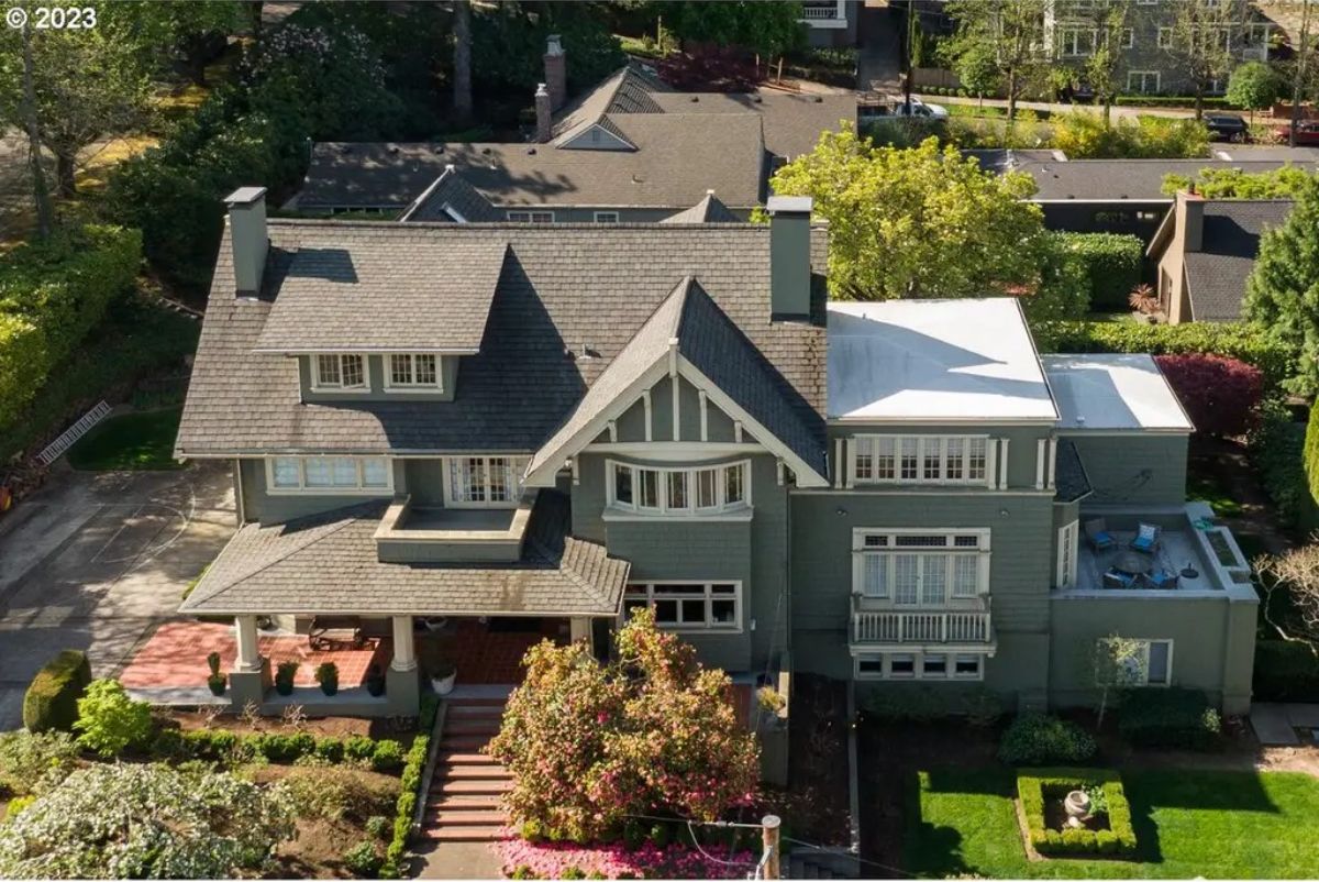 Priced at $2,195,000, this 8,413-square-foot historic home, built in 1908, features 7 bedrooms, 6 bathrooms, and blends Colonial, Tudor Revival, and Arts & Crafts architectural styles.