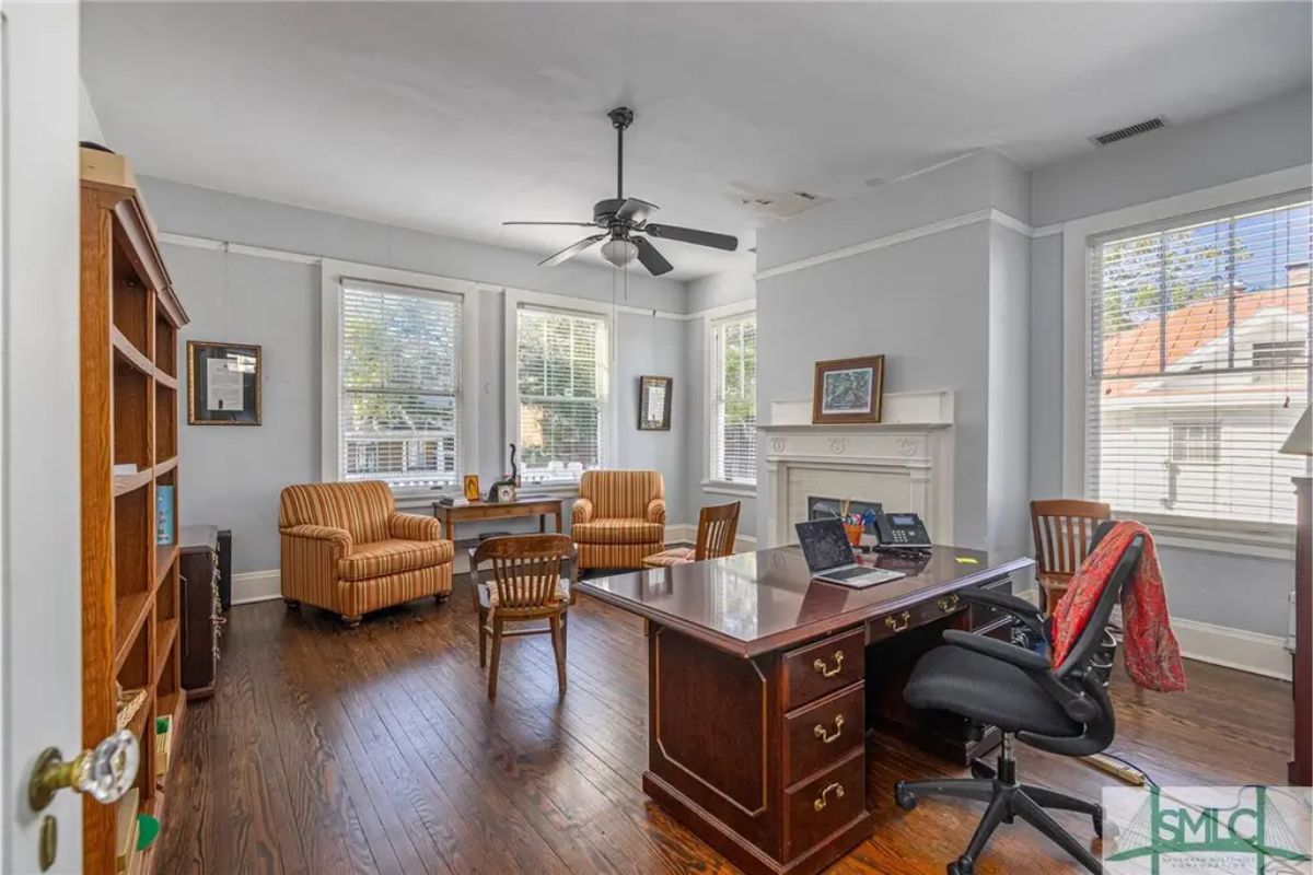 Large windows providing ample natural light and views of the surroundings.