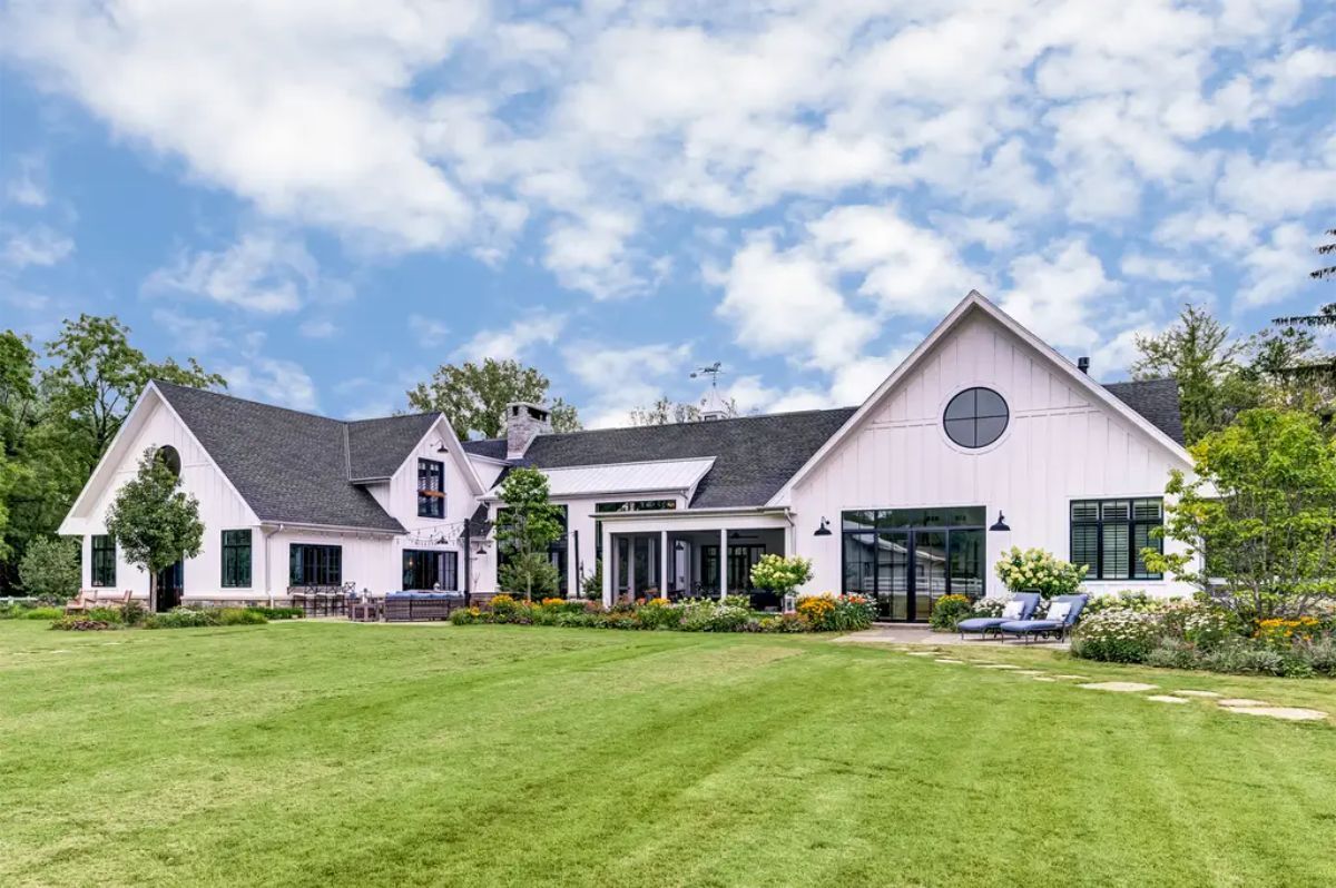 Modern farmhouse set on nearly four acres, blending elegance with functionality.