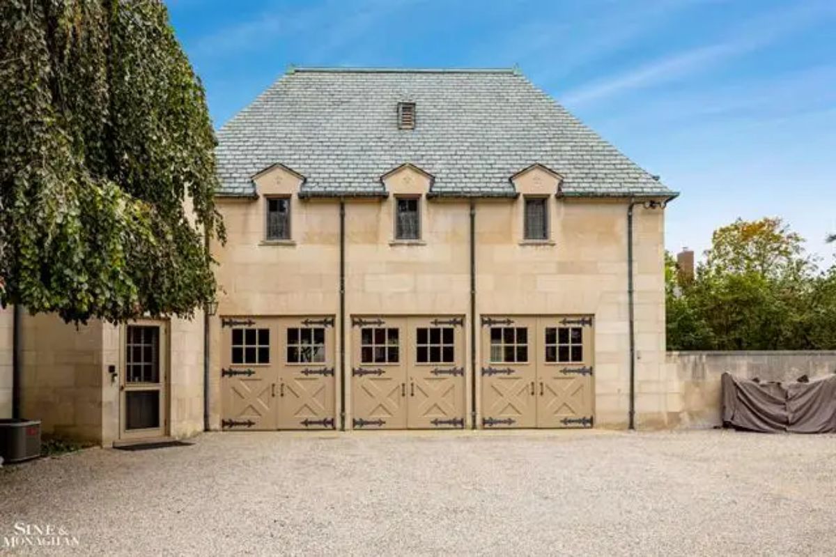 Exterior structure with intricate details and a steep slate roof.