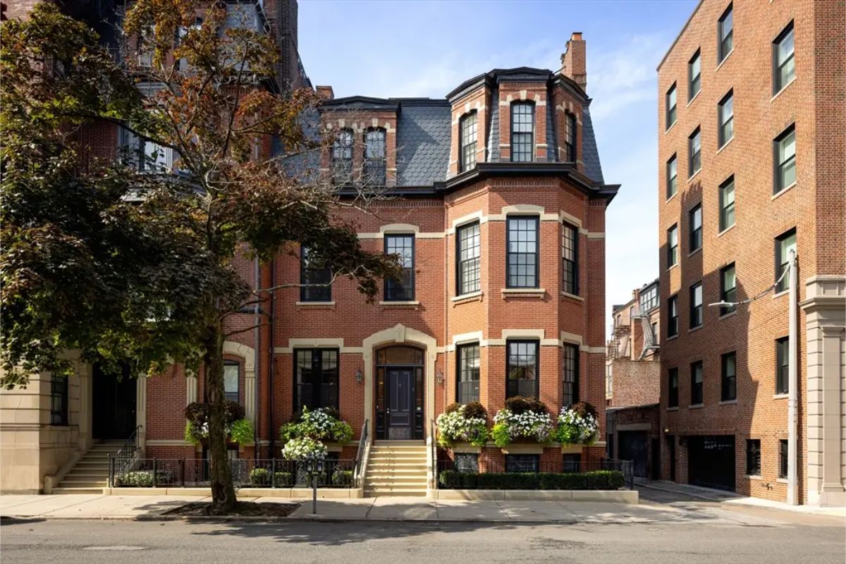 Listed for $19,995,000, this meticulously renovated brownstone in Boston's prestigious Back Bay, built in 1870, spans 9,924 sq ft with 7 bedrooms, 8 baths, and a blend of contemporary and classical design.