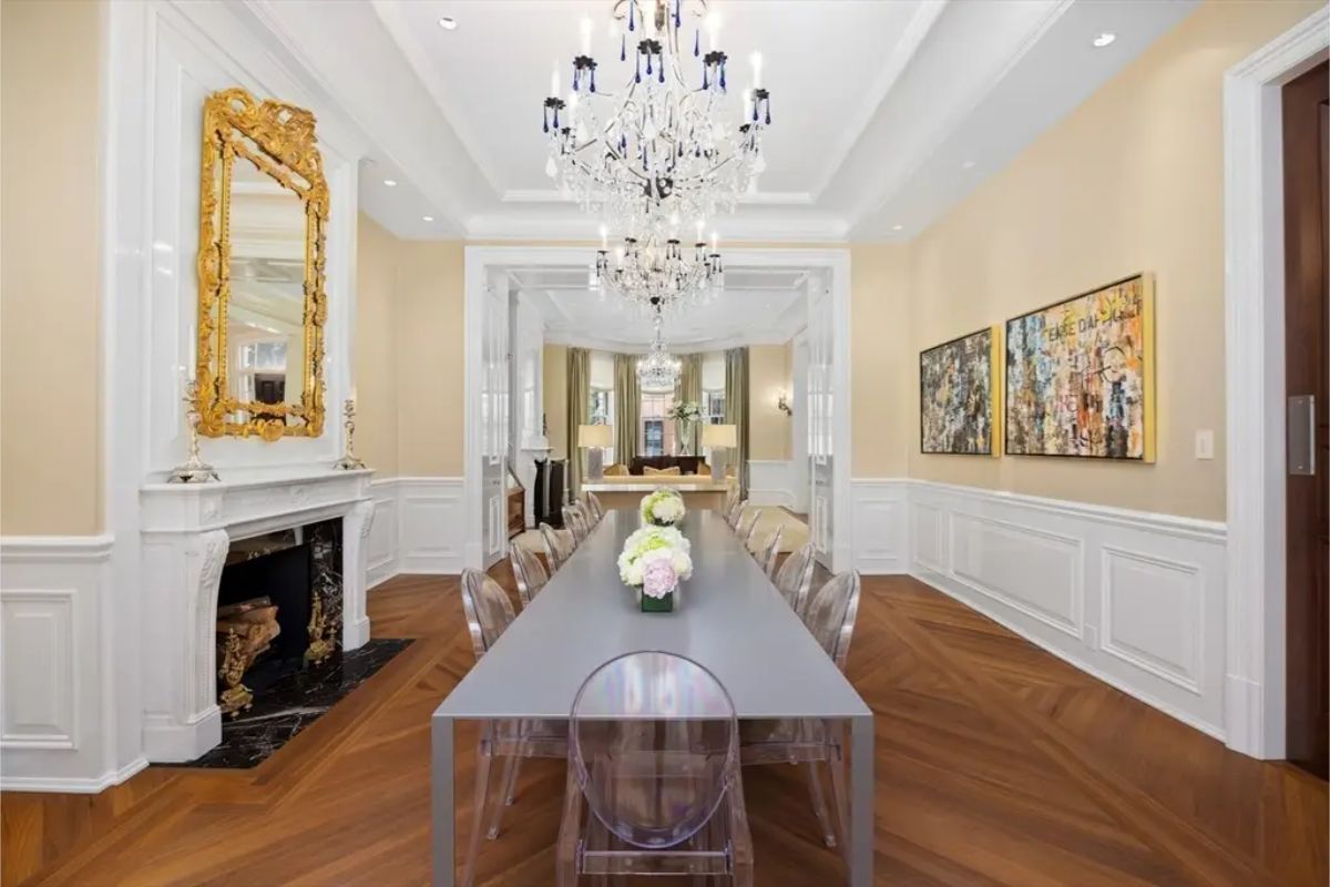 Modern table paired with transparent ghost chairs, creating a clean and minimalist aesthetic.