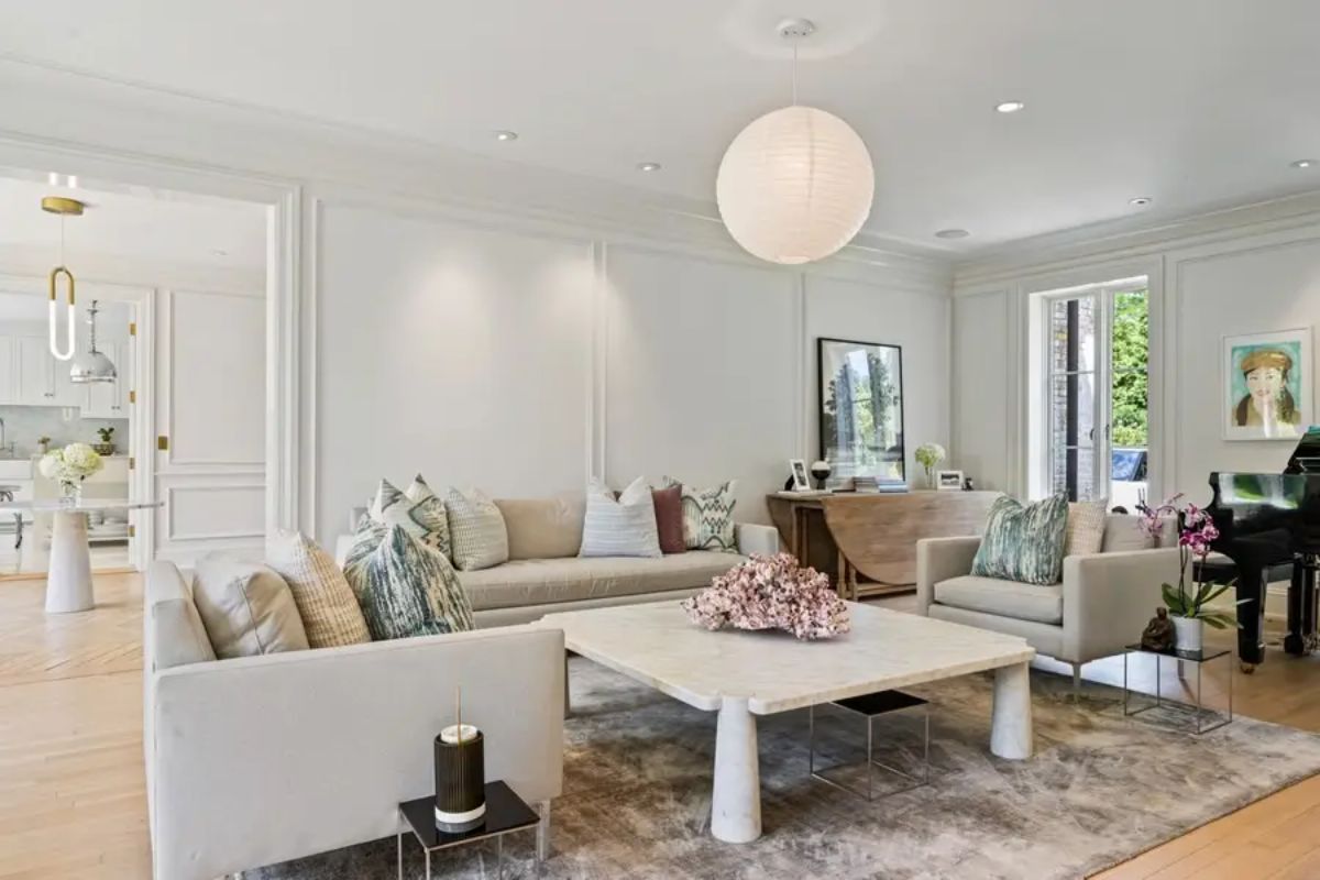 White walls and light wood flooring for a bright, minimalist aesthetic.