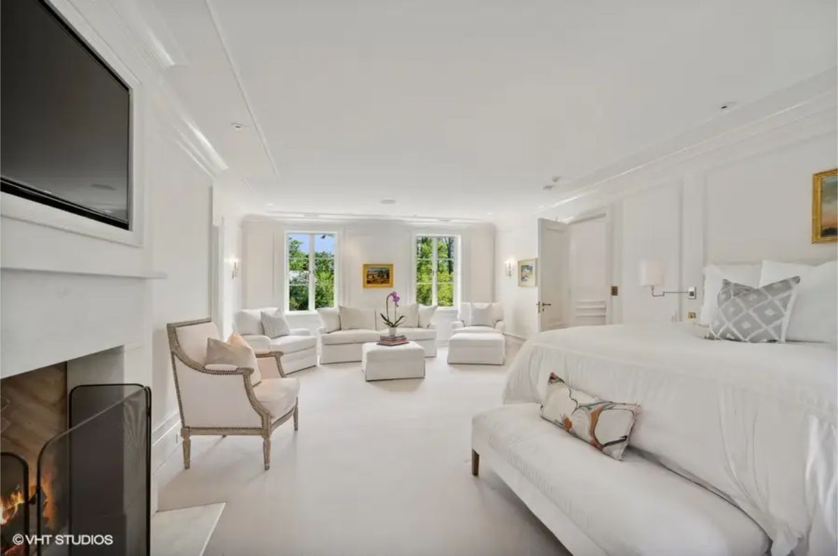 Crisp white color palette and plush carpeting.