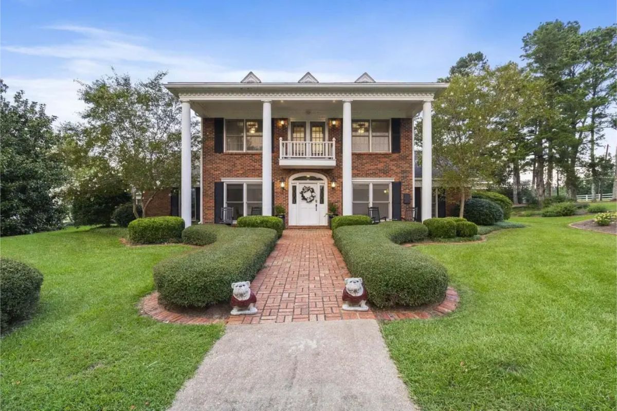 Priced at $1,225,000, this 5,025 sq ft home, built in 1980, features 4 bedrooms, 4 bathrooms, and includes a 1,250 sq ft 2-bedroom, 2-bathroom guest house.