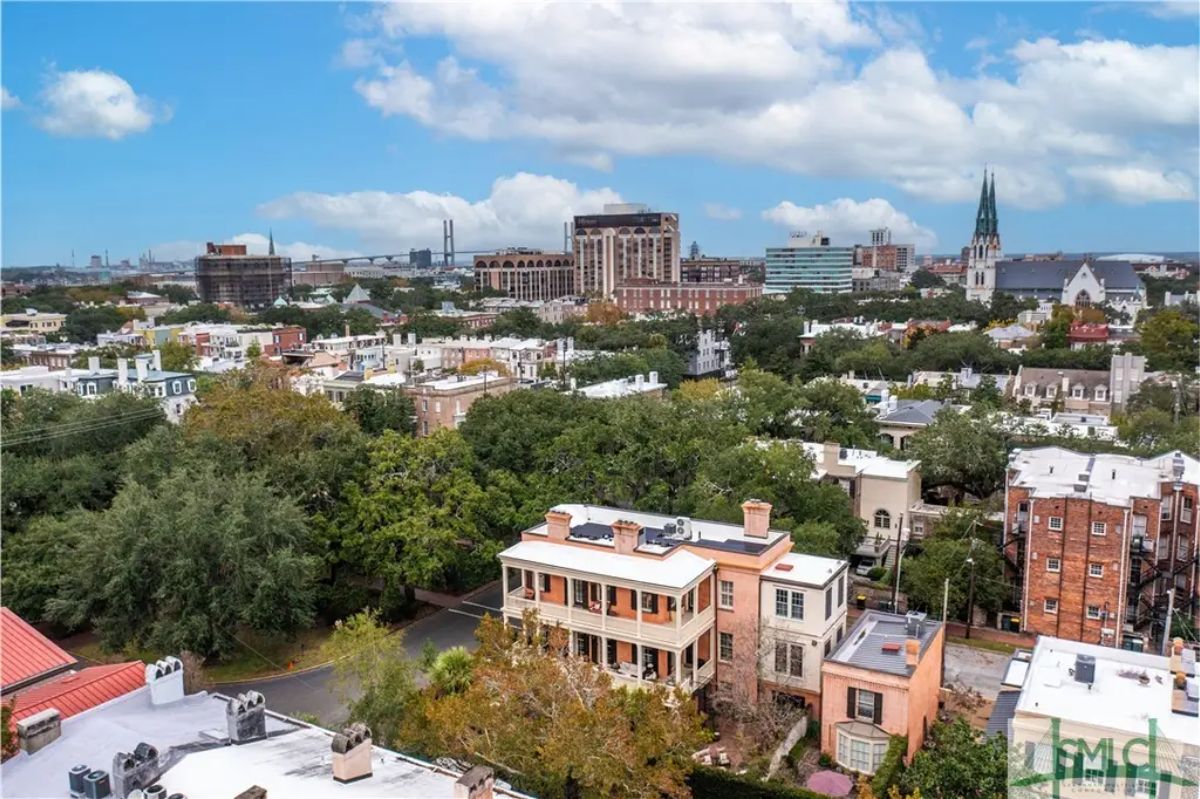 Panoramic view of Savannahโs Historic District showcasing its blend of greenery and architectural charm.