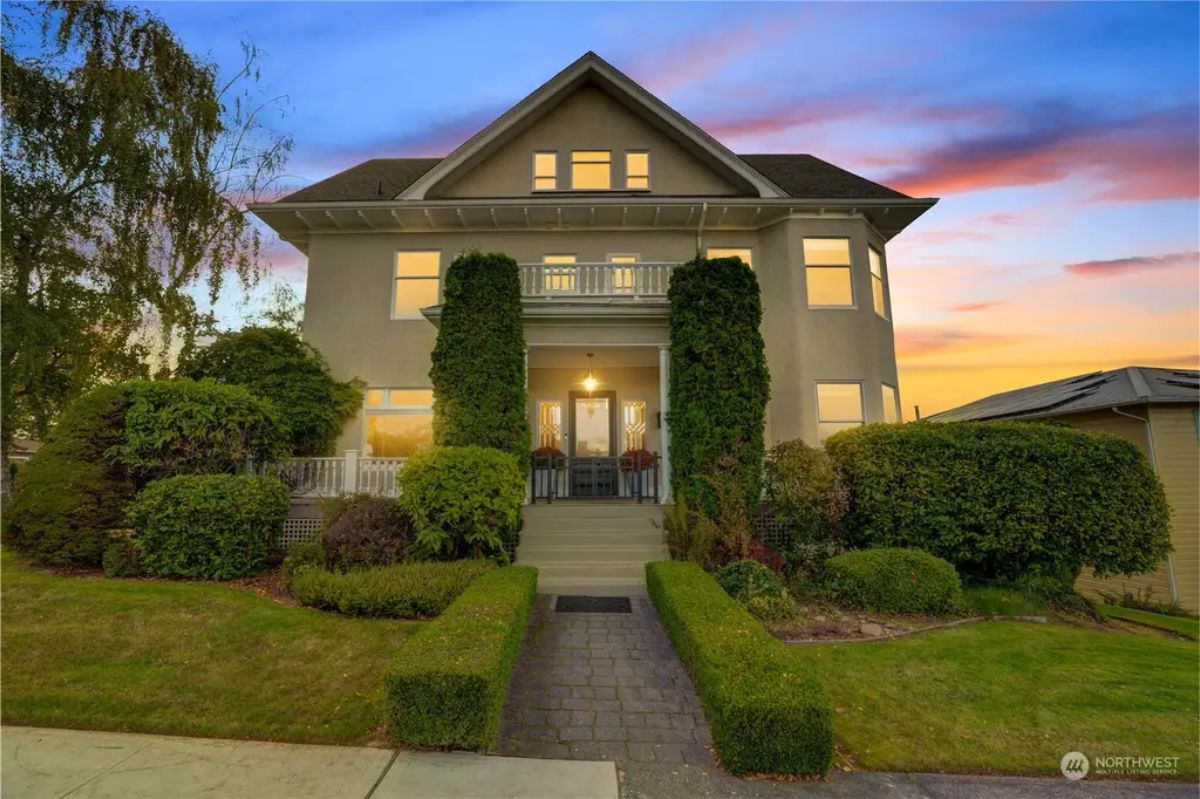 Perched above Commencement Bay, this 1908 traditional estate offers 7,386 square feet of refined living space with breathtaking views of the Puget Sound, Cascades, and Mt. Rainier.