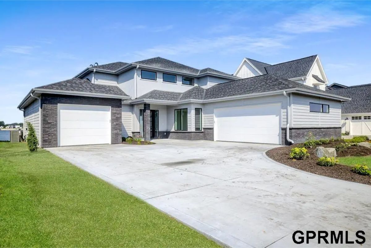This home in Valley is listed at $1,098,000. This newly built 3,429 sq. ft. lakefront home at Bluewater, completed in 2023 by Majestic Homes, features 4 bedrooms, 4 bathrooms, and a stunning open design with floor-to-ceiling sliding glass doors that showcase breathtaking lake views.