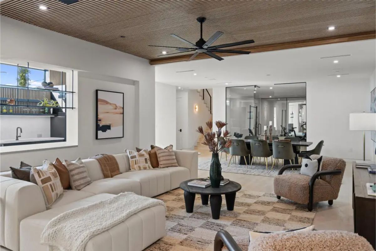 Spacious family room with a dining area and ceiling accents. 