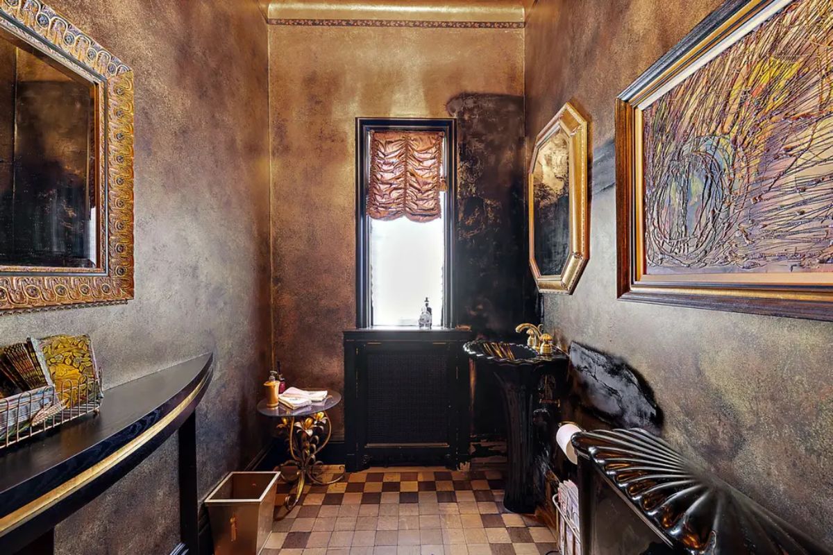 Exudes opulence with its metallic-textured walls and elegant decor.