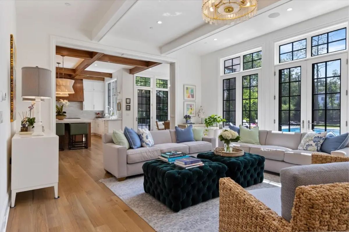 Living room connected to the kitchen and dining areas through open floor design.