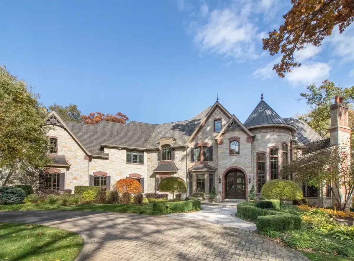 A grand stone exterior incorporates classic turret-style architecture, adding sophistication and charm.