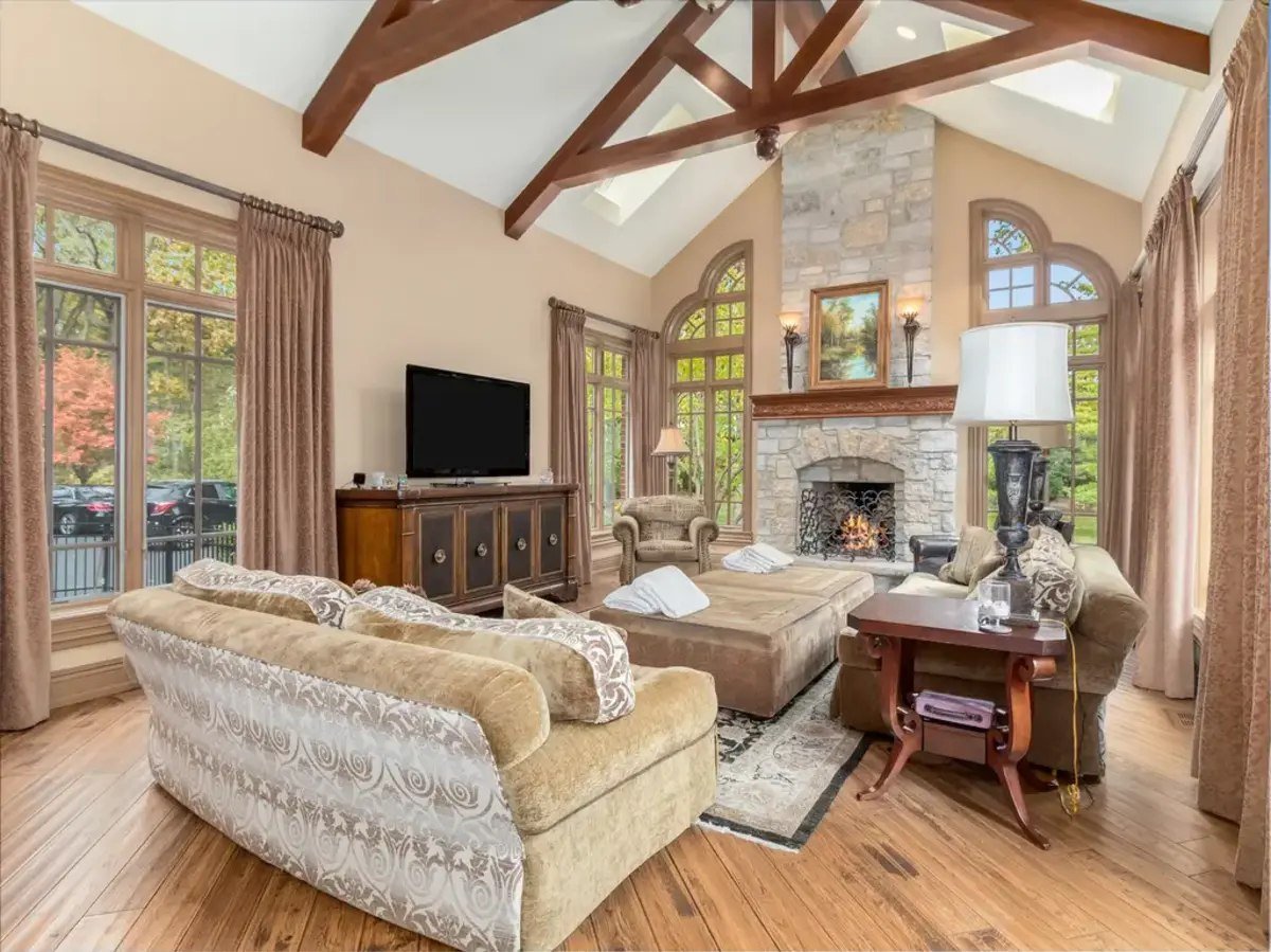 Vaulted ceilings add height and an airy feel to the cozy living room. 