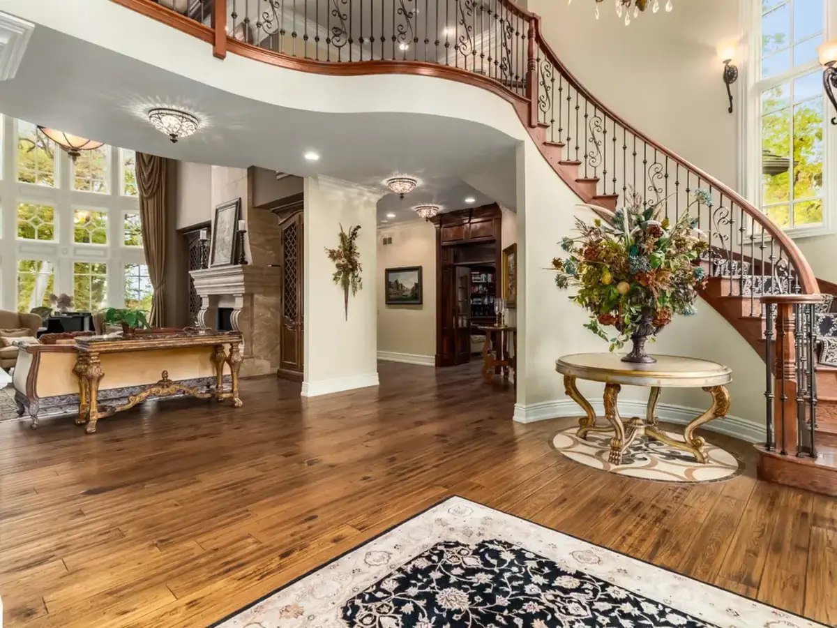 The open-concept living space seamlessly integrates comfort and elegance.