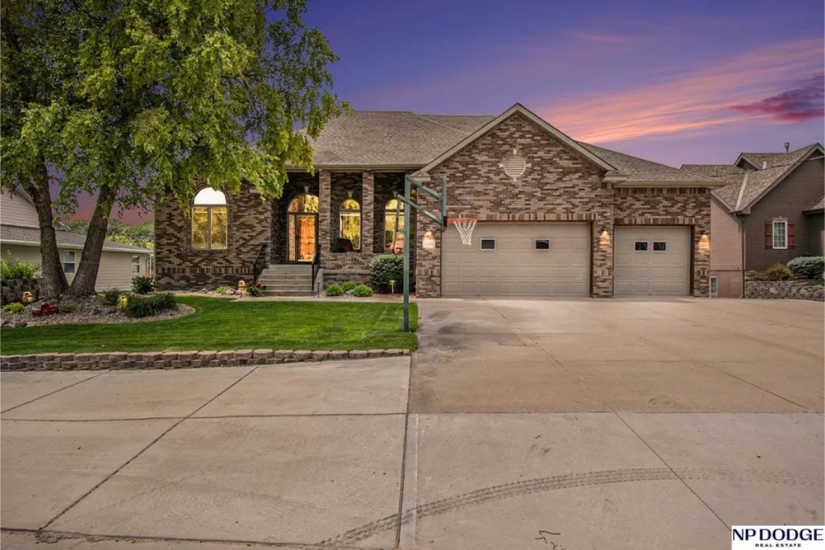All this for $1,015,000 in Fremont. This 5-bedroom, 4-bathroom ranch-style home spans 4,449 sq. ft. and offers stunning lake views from the primary suite, guest suite, kitchen, and great room.