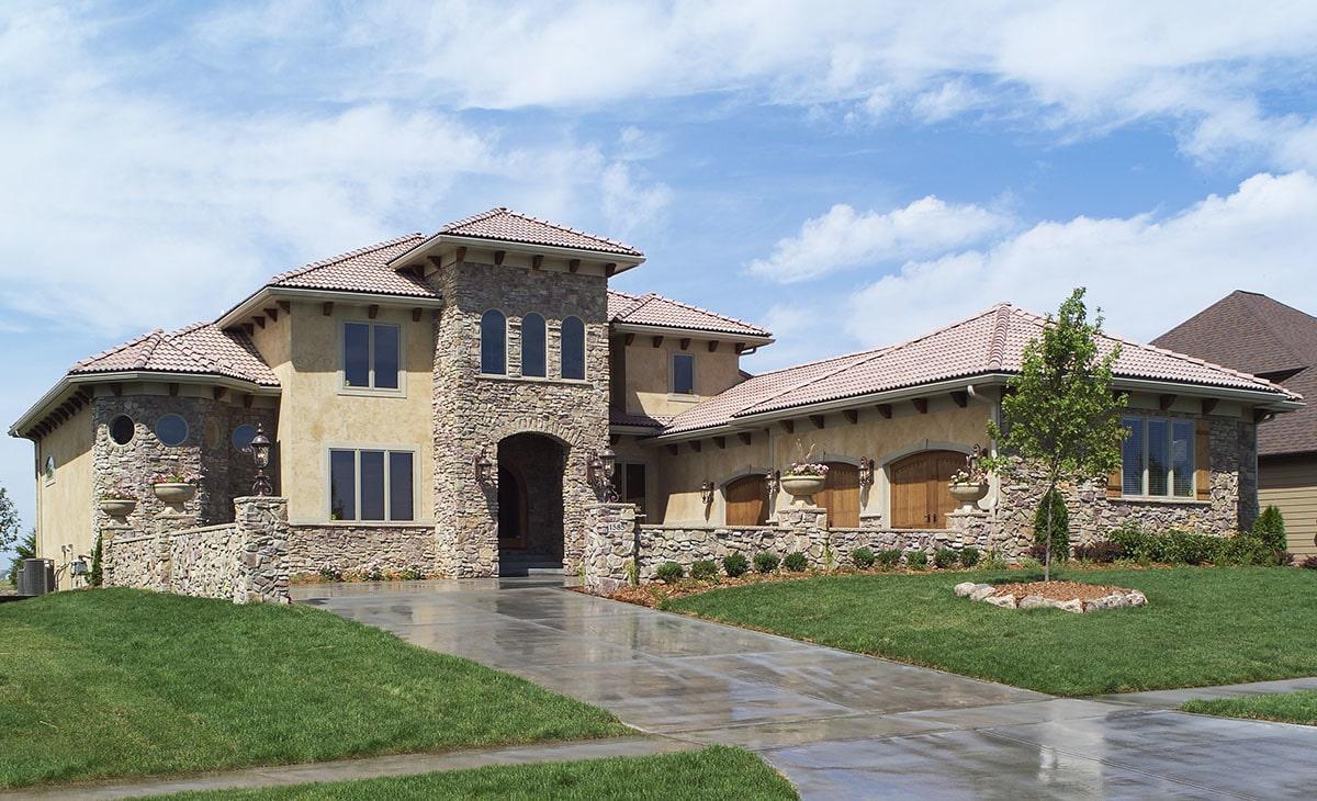 Mediterranean-Style Villa with Elegant Stone Facade