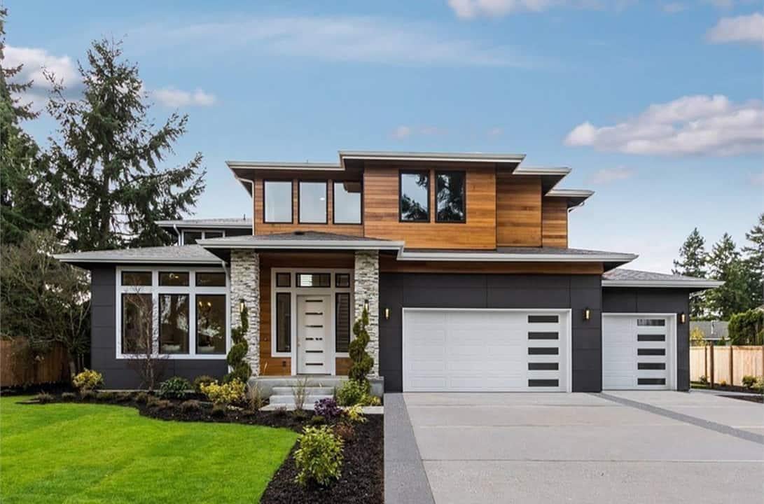 Modern Facade with Wood Accents and Striking Windows