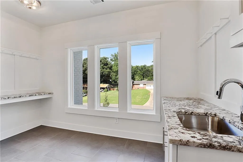 Farmhouse 5-Bedroom Home with Covered Front Porch and 3-Car Garage (4,517 Sq. Ft. Floor Plan)