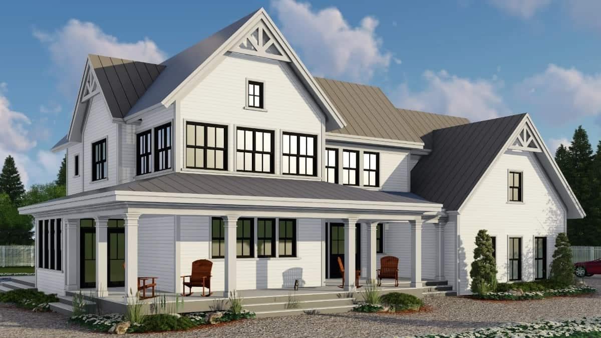 Charming Farmhouse with a Wraparound Porch and Gabled Roof