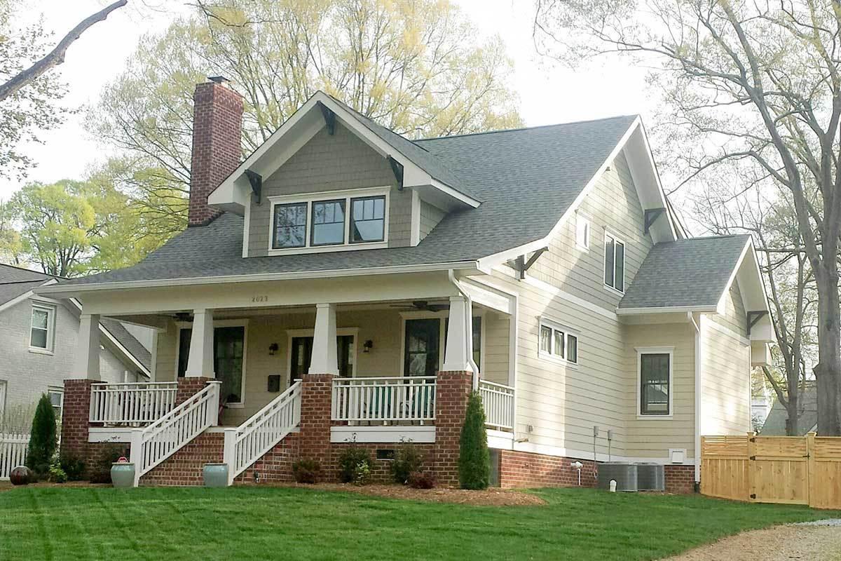 Classic Bungalow with Brick Accents and a Welcoming Porch