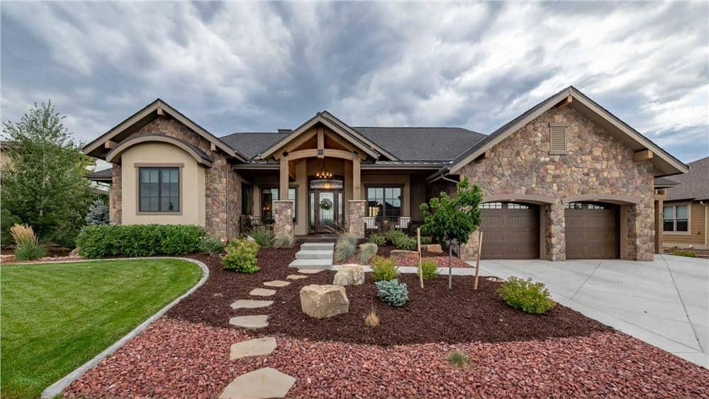 Rustic Stone Facade Meets Modern Comforts in This Beautiful Home