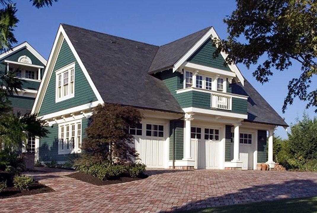 Classic Green Gabled House with Charming Dormer Windows